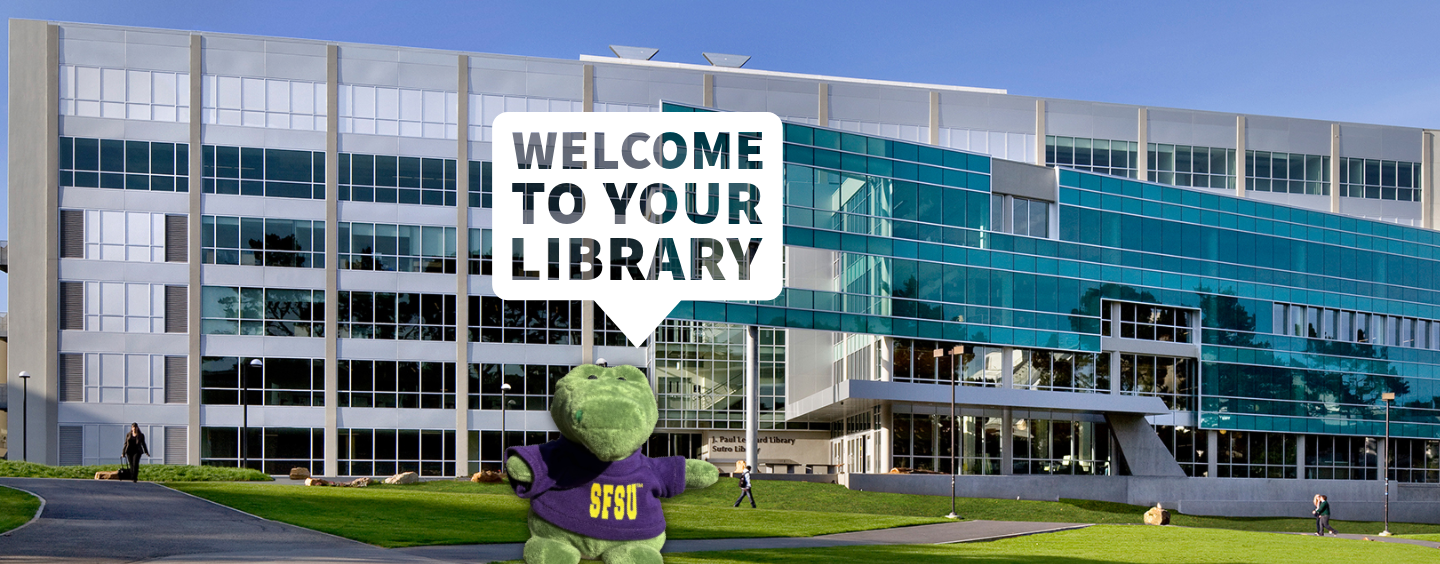 Library building with a toy gator saying "Welcome to your library"