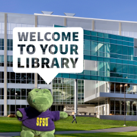 Library building with a toy gator saying "Welcome to your library"