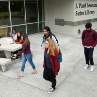 students in front of library img