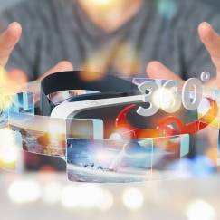 A person reaches for a VR headset in sparkly soft focus